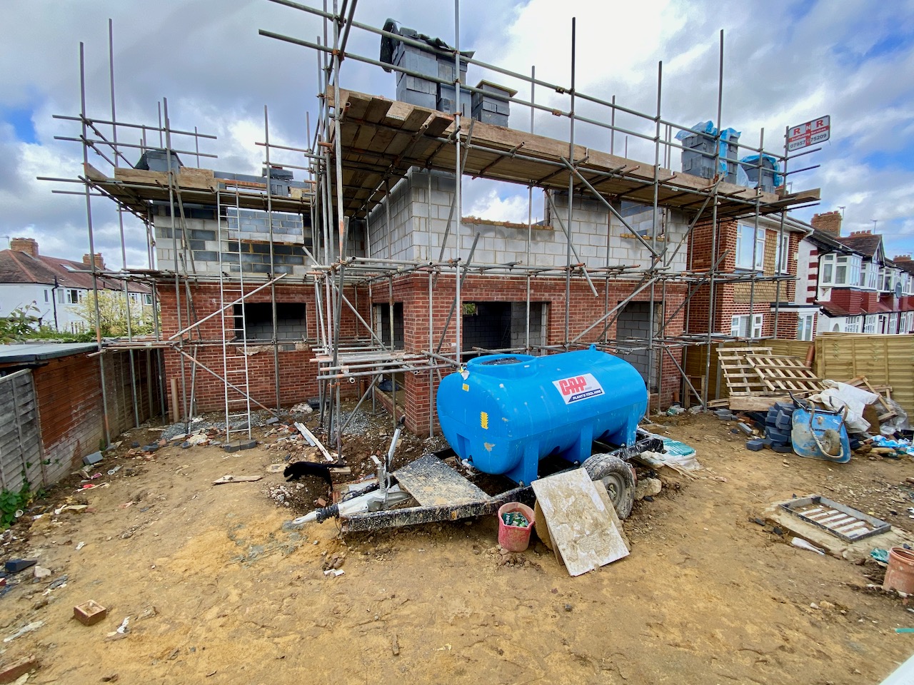 A newly built brick and block house under construction, highlighting traditional and durable building methods.